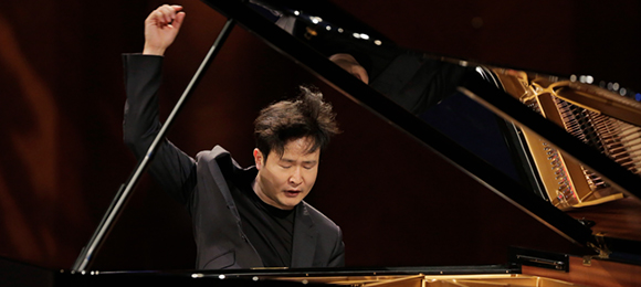 Yekwon Sunwoo mid-performance at a grand piano