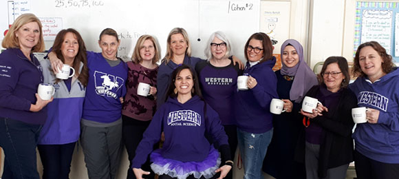 Photo of 11 women smiling