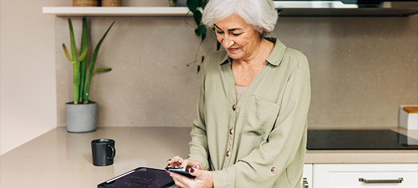 A woman typing on her smartphone.